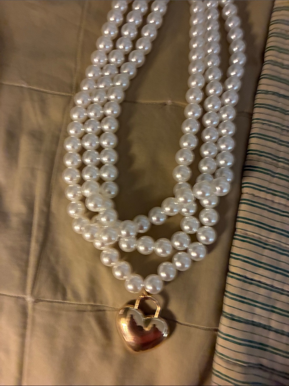 Multi-Strand White Pearl Necklace with Gold Heart Locket